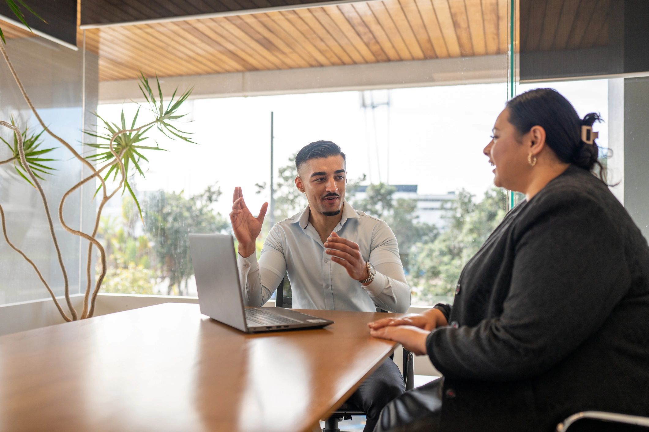 Financial adviser meeting with a client to discuss goals